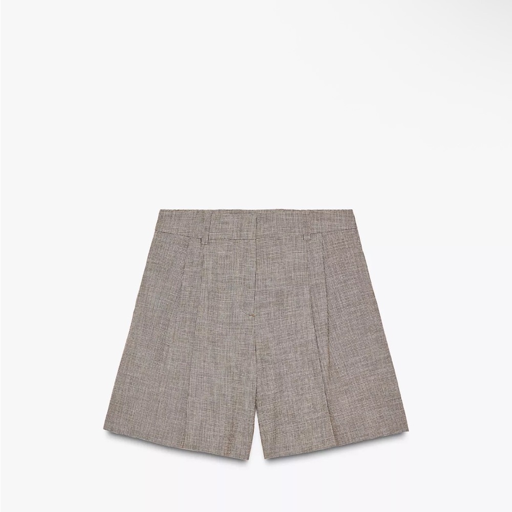 NWT Zara pleated highwaisted shorts size XS
68% cotton 5% linen 27% polyester